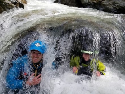 Two people having fun in the river