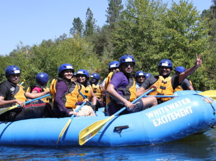 rafters pose in calm water