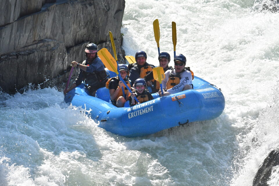 A boat going through a rapid