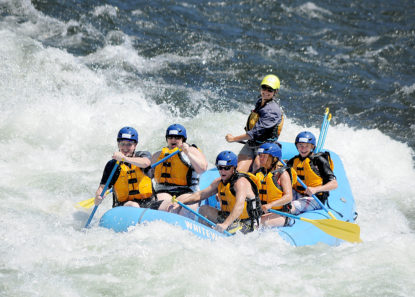 rafters smiling after big rapid