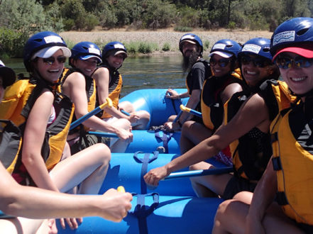 bachelorette party posing in raft