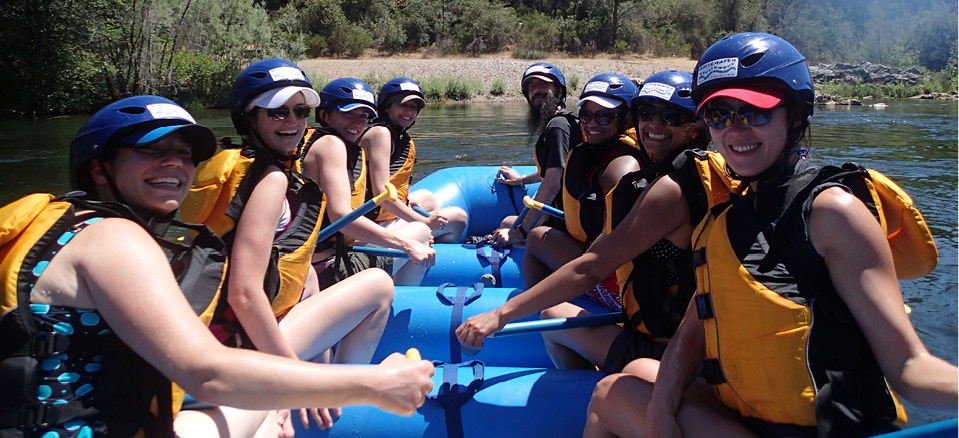 bachelorette party smiling on raft