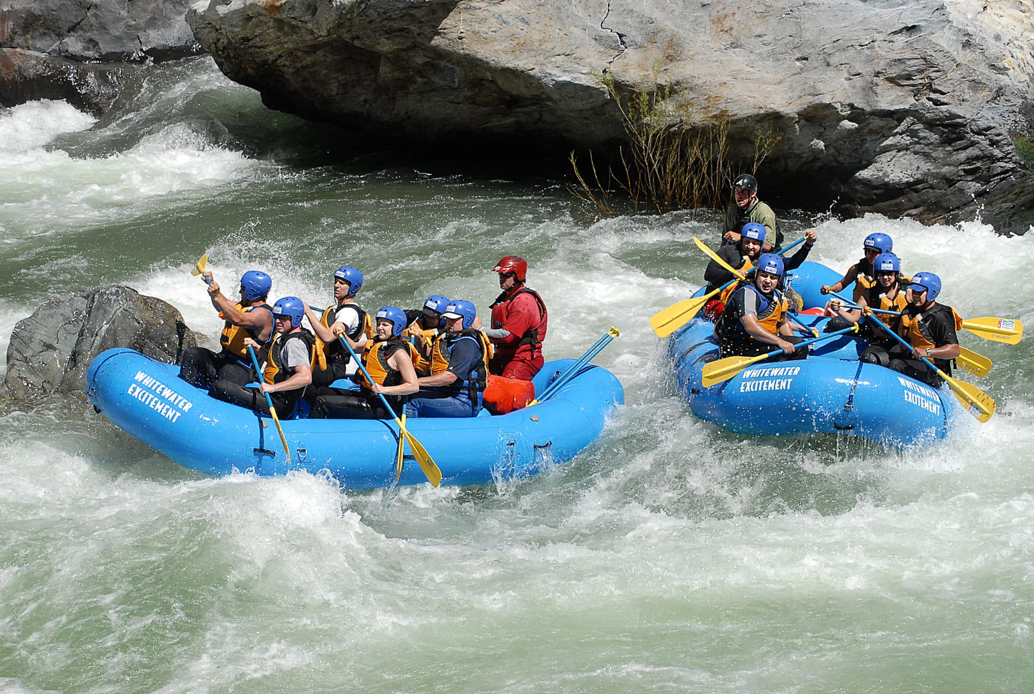 two rafts side by side in river