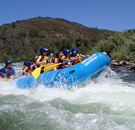 group rafting over white water