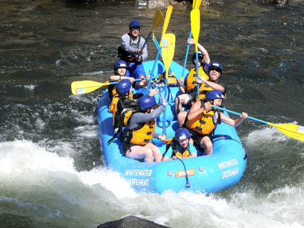 family high 5 after a rapid on american river