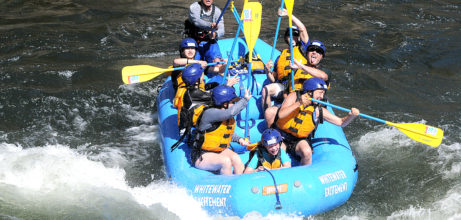 family high 5 after a rapid on american river