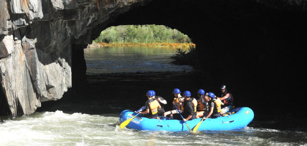 rafters entering tunnel chute on the Middle Fork American river