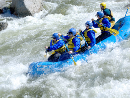 raft heading into a large rapid on north fork american river