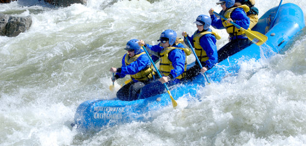 raft heading into a large rapid on north fork american river