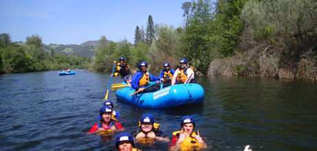 rafters enjoying a swim in the river